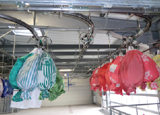 Convoyeur arien gravitaire nappe de stockage linge sale en sac ou sling