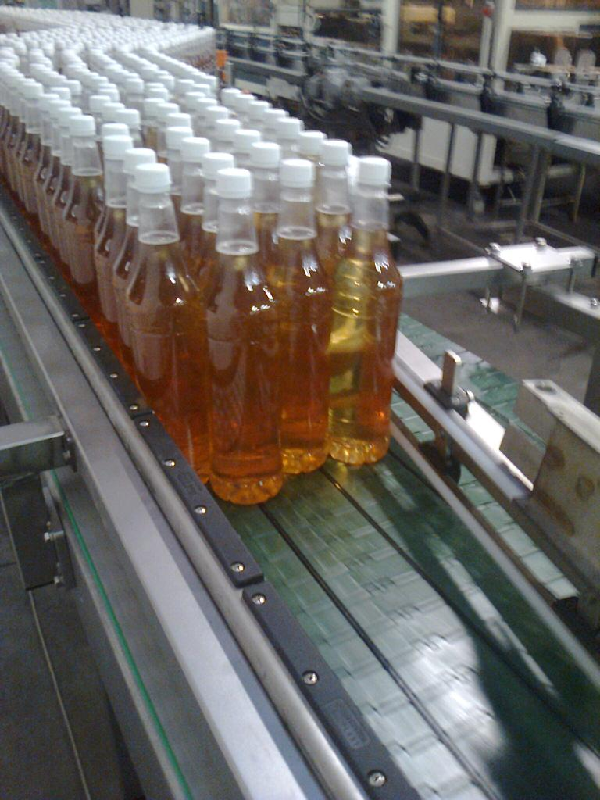 Convoyeur d'accumulation pour bouteille en verre