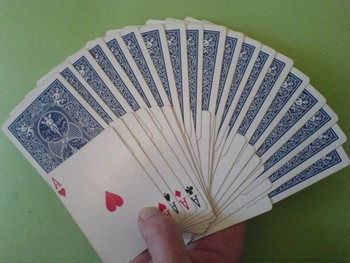 Double éventails de cartes avec apparition d'as...